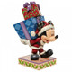 Disney Traditions Mickey Mouse dressed as Santa Claus and carrying a stack of presents Figurine