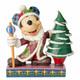 Disney Traditions Mickey Mouse dressed as Santa standing with staff in hand next to a Christmas Tree figurine