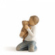 Willow Tree Kindness Boy Figurine of a boy holding a puppy