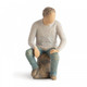 Willow Tree Figurine depicting a man sitting on a rock