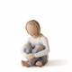 Willow Tree Spirited Child Figurine showing a child sitting with their legs crossed