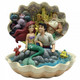 Disney Traditions The Little Mermaid, Ariel and Eric sit inside a clam shell with a scene from the film figurine