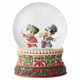 Disney Traditions Mickey and Minnie skating in Victorian garb inside a waterball figurine