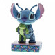 Disney Traditions Stitch, the Alien from Lilo & Stitch holding a frog figurine