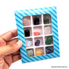 Box of 12 natural gemstone pendants