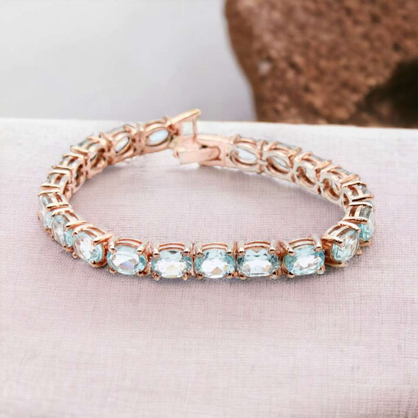 Blue Topaz Tennis Bracelet - 14K Rose Gold over Sterling Silver Blue Topaz Tennis Bracelet - 14K Rose Gold over Sterling Silver