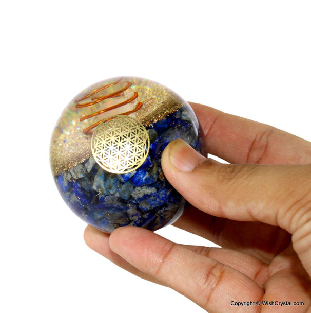 Lapis Lazuli and crystal point orgonite sphere with copper coil Lapis Lazuli and crystal point orgonite sphere with copper coil