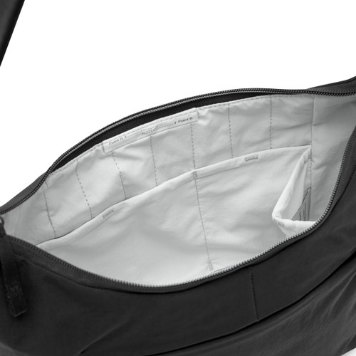 City Crescent 6L Black large interior compartment | Peak Design official