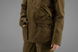 Harkila Retrieve Lady jacket, women's waterproof and breathable shooting jacket in warm olive