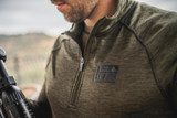 Seeland men's Peak half zip to in Pine Green Melange, breathable and stretchable fabric.