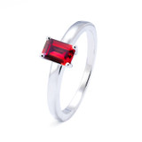 White gold ring with emerald cut ruby