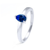 silver memorial ring with pear shaped blue sapphire