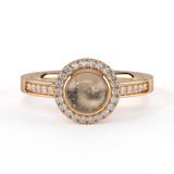 ashes diamond ring with visible ashes in rose gold and glass