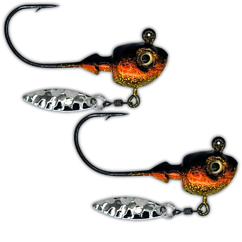 Big Sky Gold Orange Black Splash Hecla Hammer jig on white background showing gold, orange, and black color pattern with baitfish profile