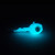 Blue Sparkle White Bottom Snake Eye jig showing Kryptonite Glow finish in low light
