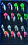 Close-up of Big Sky Jigs Hecla Hammer jigs from the Lake Winnipeg Pro Pack showing painted heads, blades, hooks, and glow finishes
