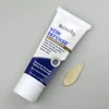 Applying TriDerma Vein Defense cream to leg – non-greasy formula for visible veins and spider veins on body