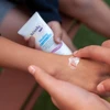 Close-up of TriDerma baby healing cream texture – smooth, non-sticky formula that absorbs quickly