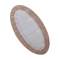 Super absorbent dressing applied over moderate to heavily exuding wound on leg or torso