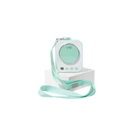 Close up of Motif Roam rechargeable electric breast pump with USB-C charging cable and power adapter plugged in
