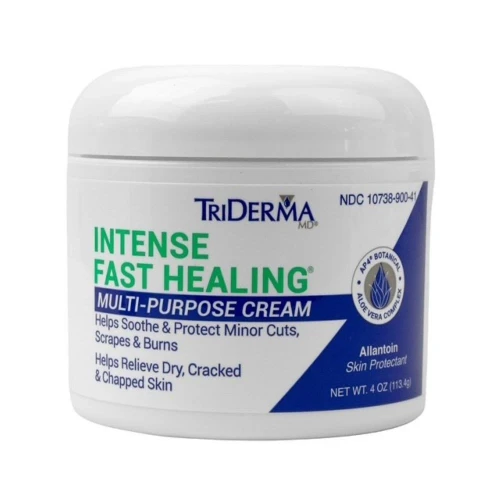 Applying TriDerma intense healing cream to dry cracked hands – non-greasy formula that soothes and restores damaged skin