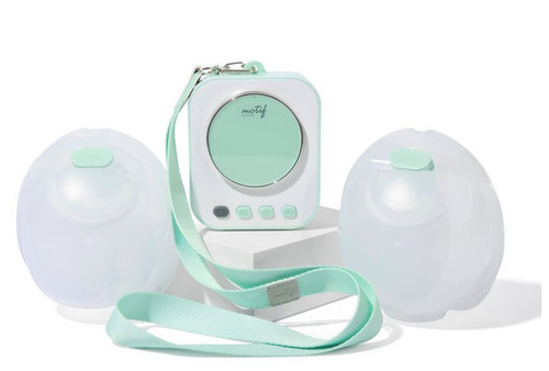Motif Roam breast pump kit with digital screen and collection cups on white background