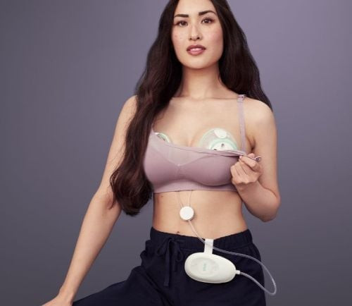 Complete Elvie Stride kit including pump hub, collection cups, breast shields, bottles, tubing, and charging cable