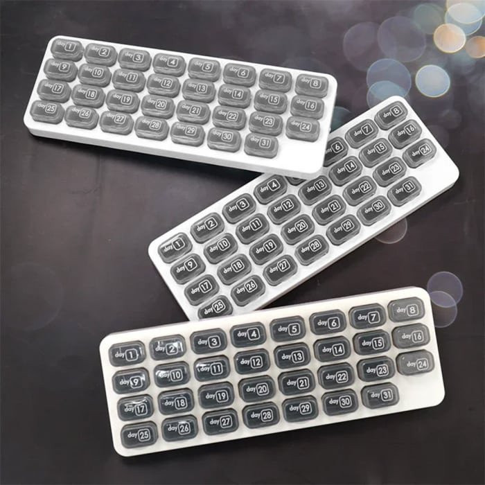 Overt Month Pill organizer with dates, practical & Bold design