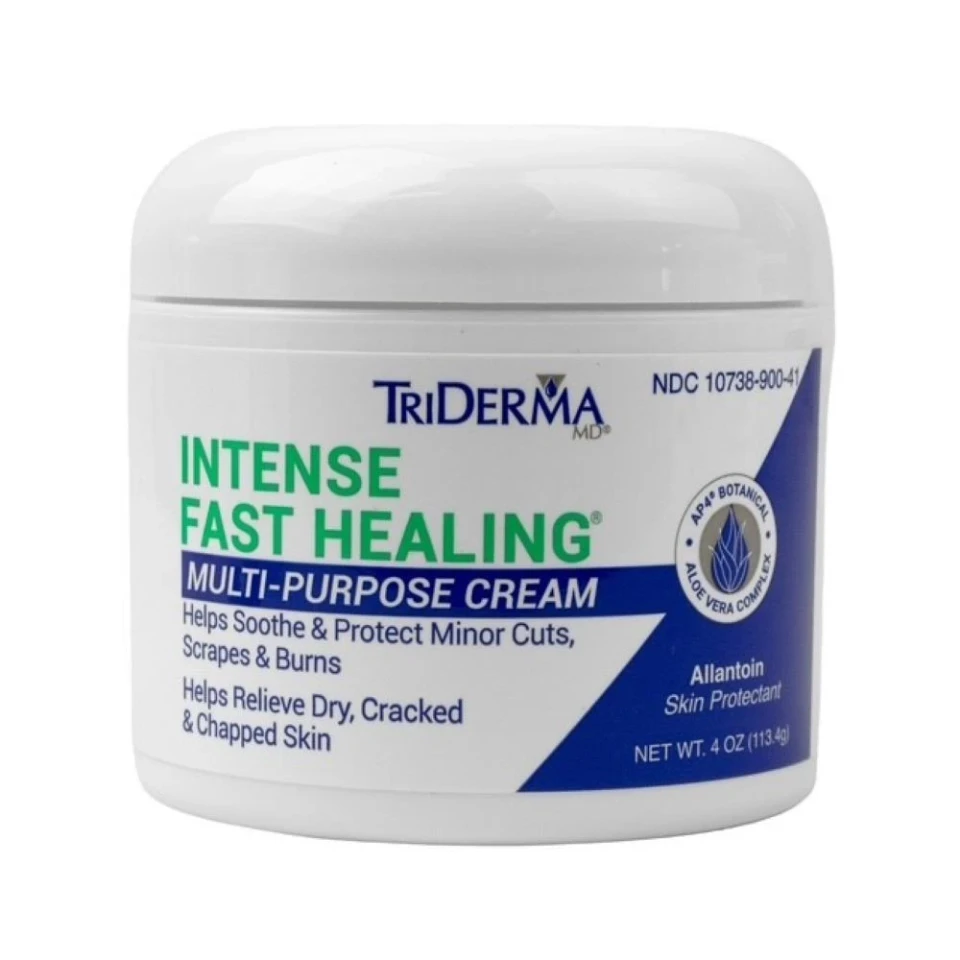 Applying TriDerma intense healing cream to dry cracked hands – non-greasy formula that soothes and restores damaged skin