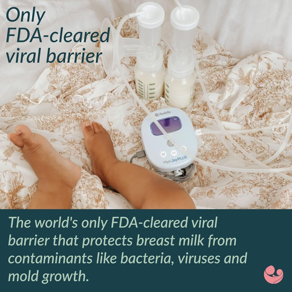 Hygienic closed system breast pump with protective barrier demonstrating clean tubing design
