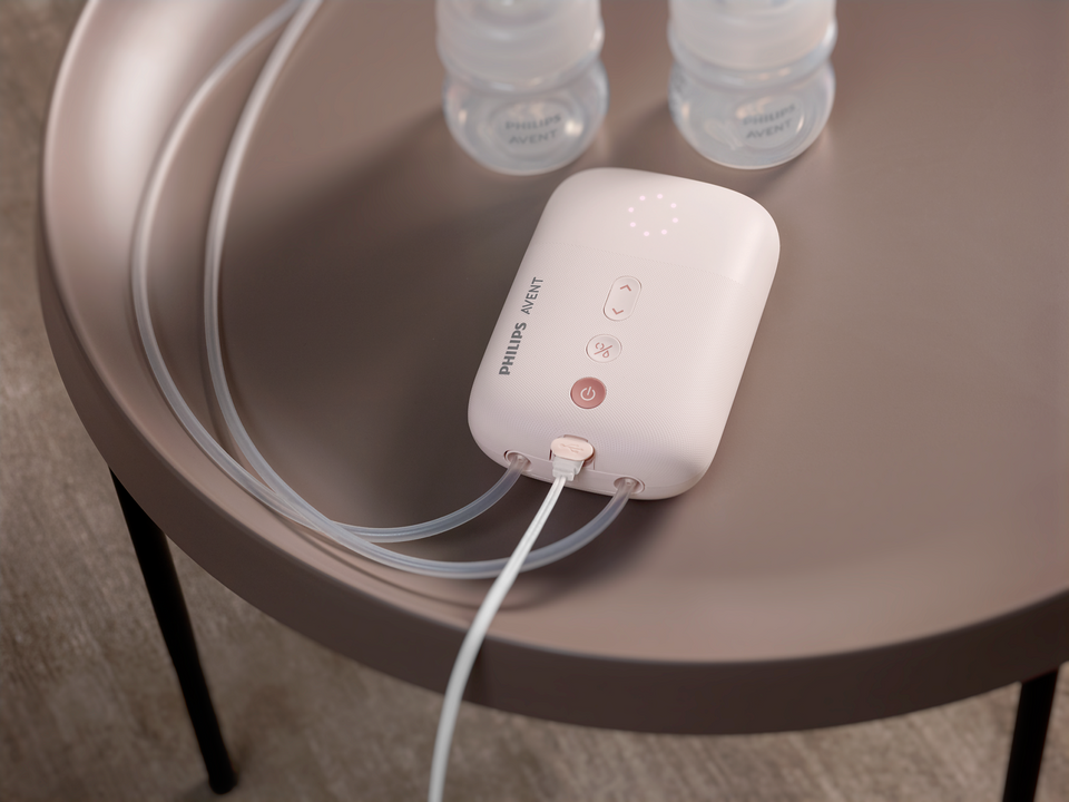 Control panel of Philips Avent pump showing stimulation and expression level settings