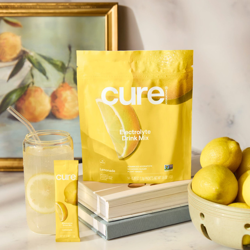 Pouch of Cure plant-based hydration powder with 14 single-serving packets