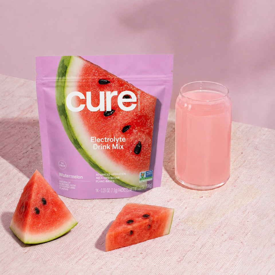 Pouch of Cure plant-based hydration powder with 14 single-serving packets