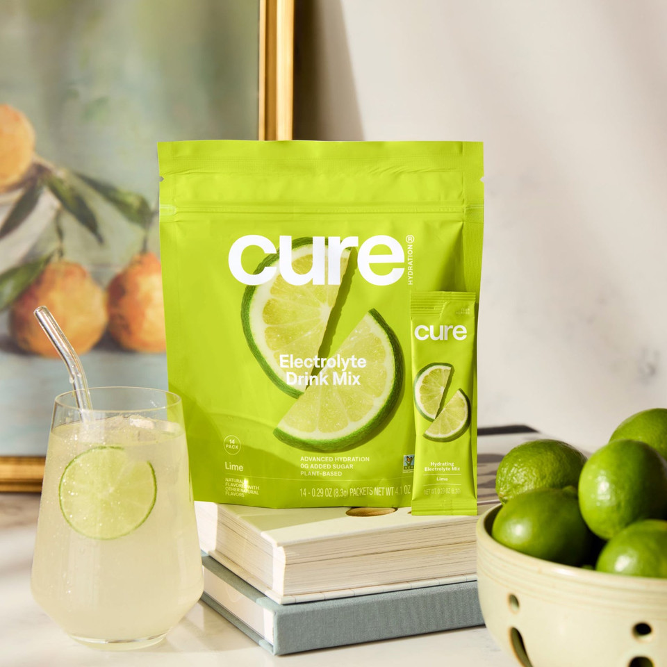 Pouch of Cure plant-based hydration powder with 14 single-serving packets