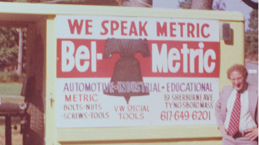 An old photograph of Ralph Lomando infront of a BelMetric delivery truck