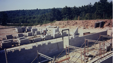 An old photograph of the BelMetric warehouse under construction.