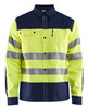 The BLAKLADER 3255 High Vis Yellow/Navy Blue Long Sleeve Shirt is designed for maximum visibility and safety in the workplace.
