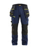 Crafted by BLAKLADER, the Work Pants model 1970 in Dark Navy Blue / Yellow features Kneepad Pockets, offering Detachable Holster Pockets, and built from 2-Way Stretch for reliable workwear performance.