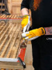 Speedheter’s board scraper is effective and easy to use on heated paint.
