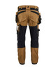 Whether on the job or off-duty, the BLAKLADER Trousers 1750 in Khaki Brown, featuring Holster Pockets, Kneepad Pockets, and made of Cotton with Stretch, keeps you moving freely.