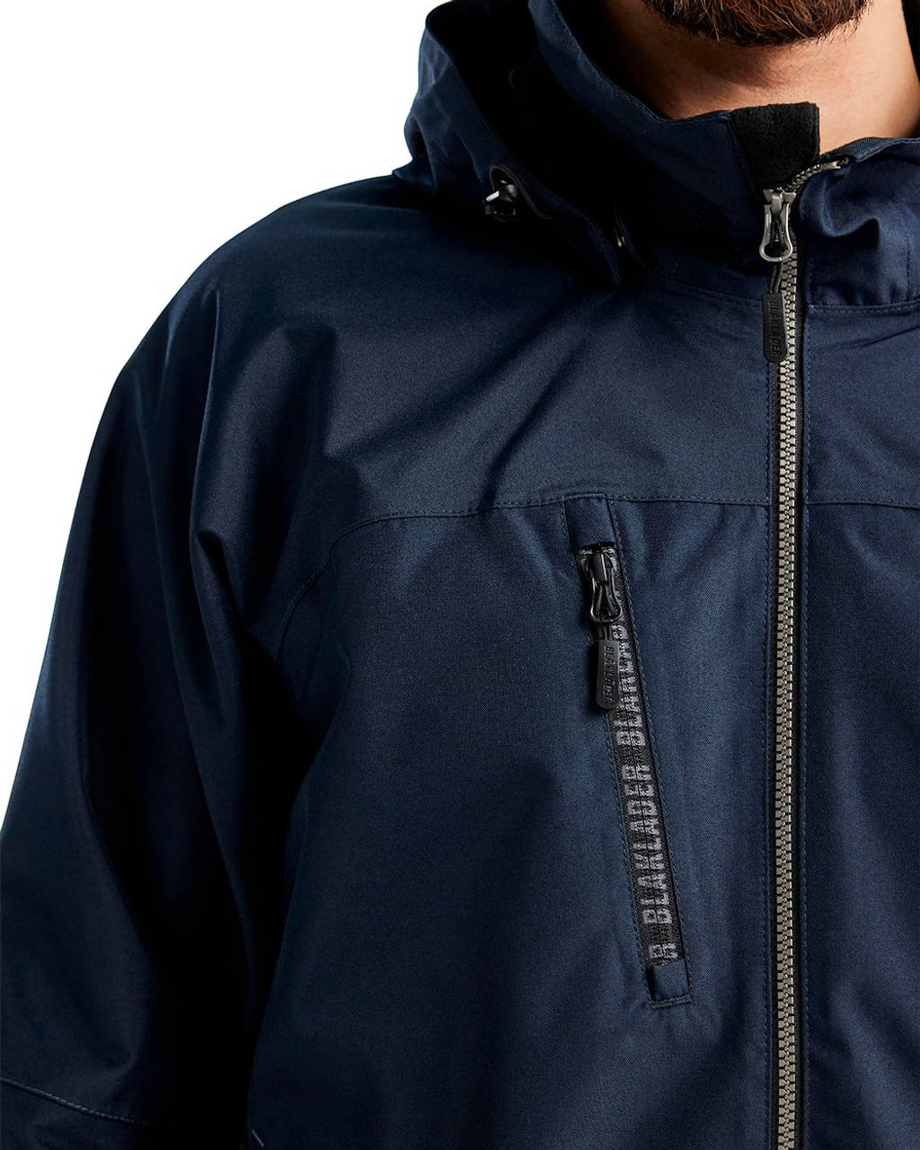 The Blaklader Shell jacket in Dark Navy Blue  is a must-have for any worker.