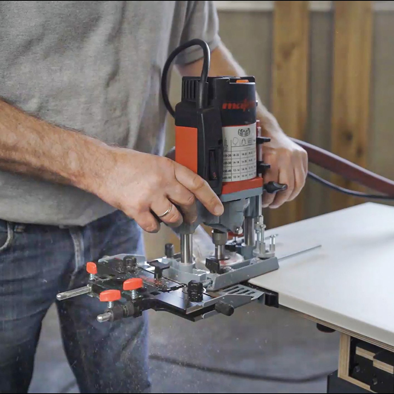 MAFELL Router Adapter for Guide Rails combines a rip fence, guide rail adapter, compass, and pocket milling template, making it an essential accessory for woodworking enthusiasts and professionals alike.