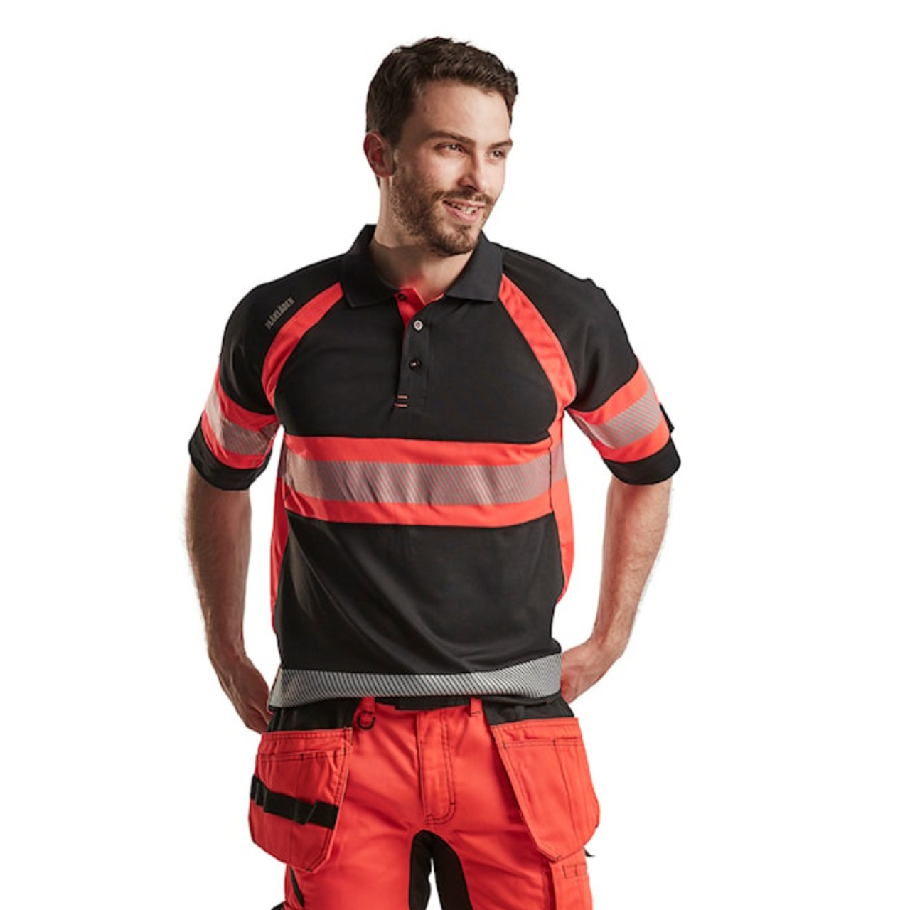 Stay comfortable and visible with the BLAKLADER 3338 Men's Black / High Vis Red UV Protection Profile Polo Shirt.