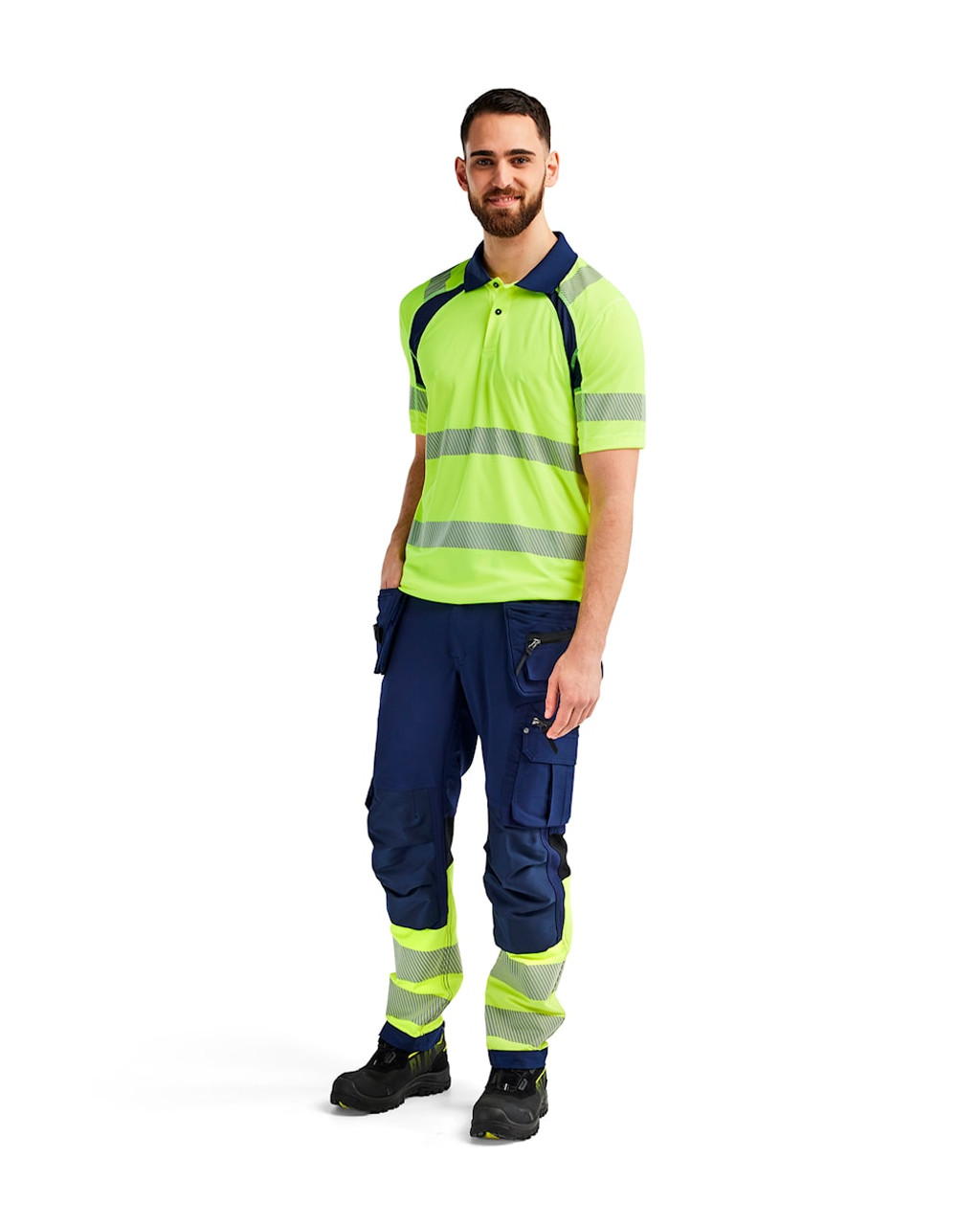 When moisture control matters, the BLAKLADER Shirts in High Vis Yellow / Navy Blue offers moisture-wicking UV Protection and a resilient Polyester construction, balancing comfort and durability for electricians.