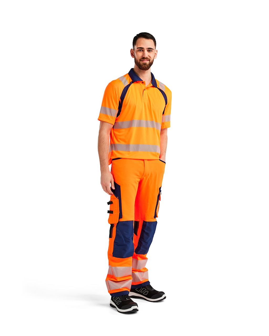 When moisture control matters, the BLAKLADER Shirts in High Vis Orange / Navy Blue offers moisture-wicking UV Protection and a resilient Polyester construction, balancing comfort and durability for electricians.