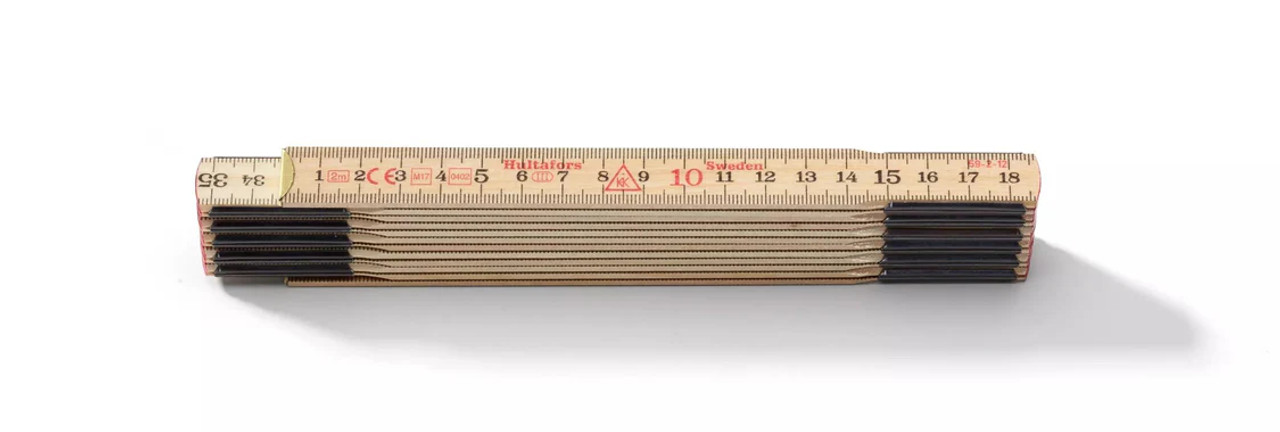 The HULTAFORS Folding Ruler 59-2-12 is a classic 2-meter timber measuring tool, essential for every craftsman. The HULTAFORS Folding Ruler 59-2-12 is a classic 2-meter timber measuring tool, essential for every craftsman.