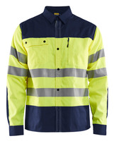 The BLAKLADER 3255 High Vis Yellow/Navy Blue Long Sleeve Shirt is designed for maximum visibility and safety in the workplace.