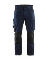 Experience ultimate comfort in the BLAKLADER Navy Blue Craftsman Trousers (1751)—designed with Kneepad Pockets, and crafted from Cotton with Stretch.