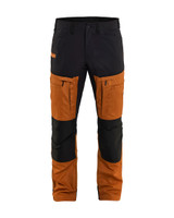 Tailored by BLAKLADER, the Service Pants model 1456 in Rust Brown incorporates Kneepad Pockets, providing Stretch, and constructed from Polyester to work as hard as you do.
