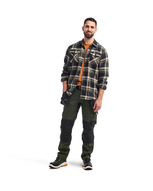 When precision matters, the BLAKLADER Shirts in Forest Green / Black offer stretchable Flannel and durable Cotton, giving woodworkers the freedom and protection they need.